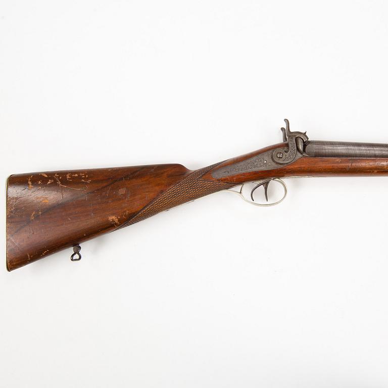 A mid-19th Century Belgian double barreled percussion shotgun marked Canon A Rubans.