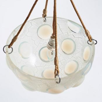 René Lalique, a 'Soleil' moulded opalescent glass ceiling light, France 1920-30s.