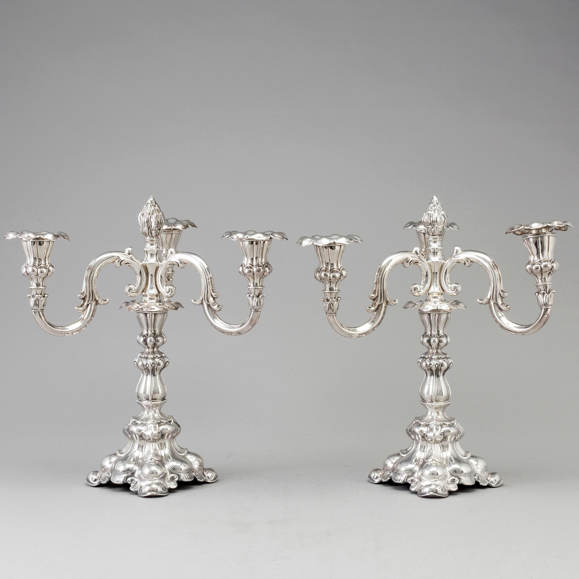 A pair of silver candelabras from CG Hallberg, Stockholm 1935.