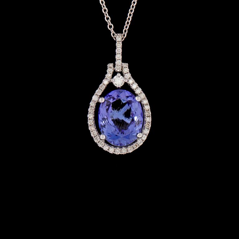 HÄNGE, 18k vitguld med briljantslipade diamanter 0.28 ct samt ovalslipad tanzanit, 4.56 ct. Vikt 11 g.