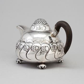 A Danish Art Nouveau silver teapot, maker's mark EVALD NIELSEN, Copenhagen, 1919.