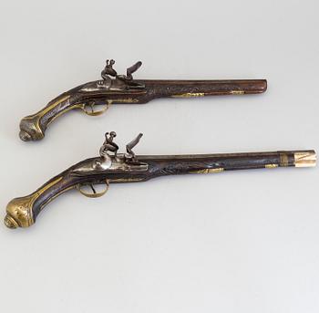 2 18th century flintlock pistols for the oriental market.