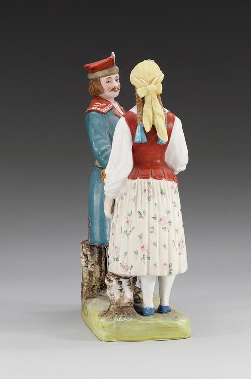 A Russian bisquit figurin depicting a Polish man and woman, Gardner manufactory, ca 1900.