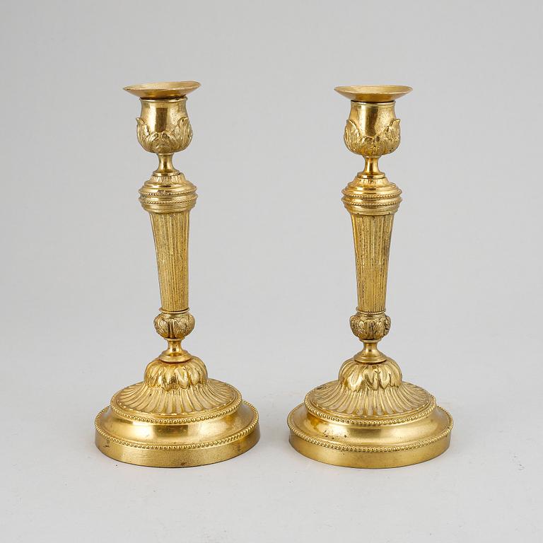 A pair of Louis XVI-style candlesticks, ca 1900.