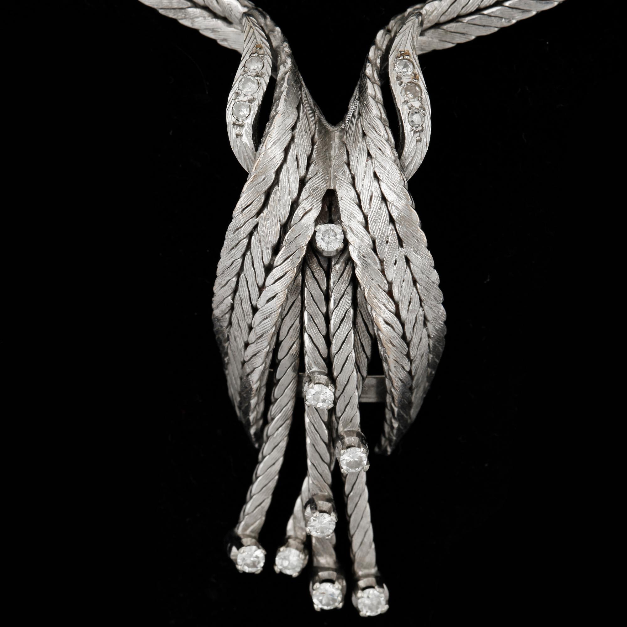 COLLIER, 18k vitguld med briljantslipade diamanter tot ca 0,25 ct. Vikt ca 43 gram.