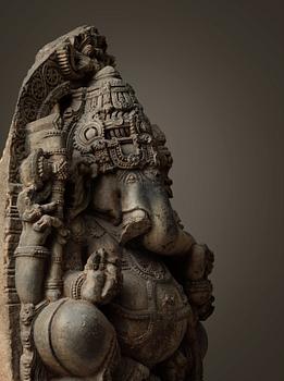 A stone figure of Ganesha, India, Karnataka, Hoysala period, 11/12th Century.