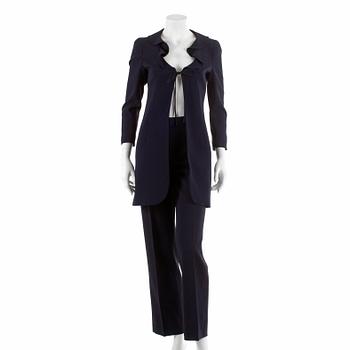 MOSCHINO, a two-piece suit consisting of jacket and pants.
