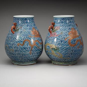 A pair of large enamelled vases with five clawed dragons, presumably late Qing dyasty with Yongzheng mark.