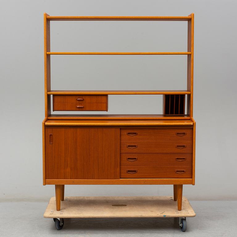 A 1960s teak veneered shelf.