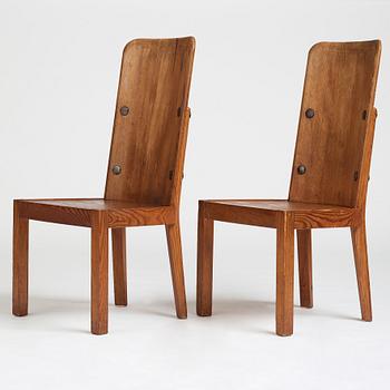 Axel Einar Hjorth, a pair of stained pine "Lovö" chairs, Nordiska Kompaniet, Sweden 1930's.