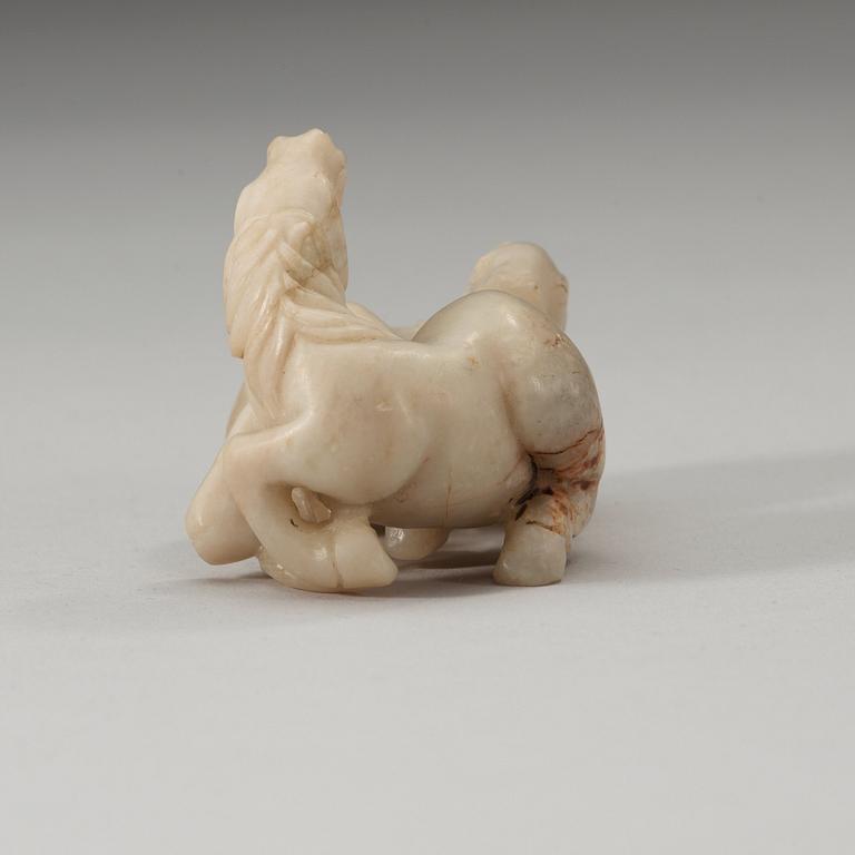 A nephrite figure of horses, China.