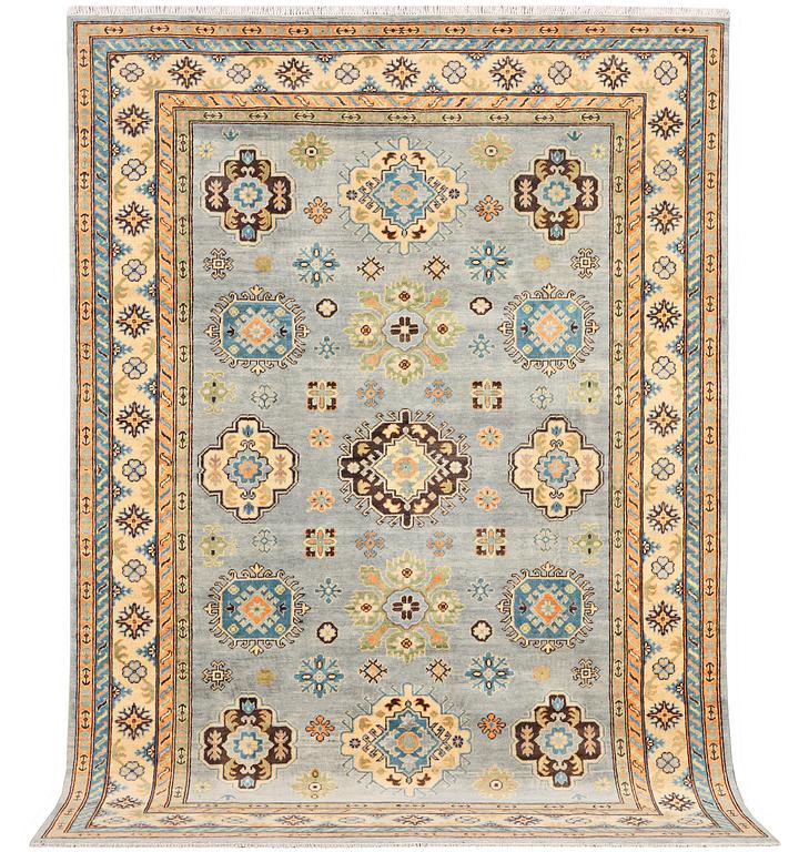 A Kazak carpet, c. 295 x 206 cm.