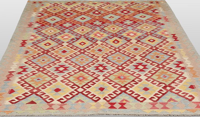 A Kilim rug, approx. 251 x 189 cm.