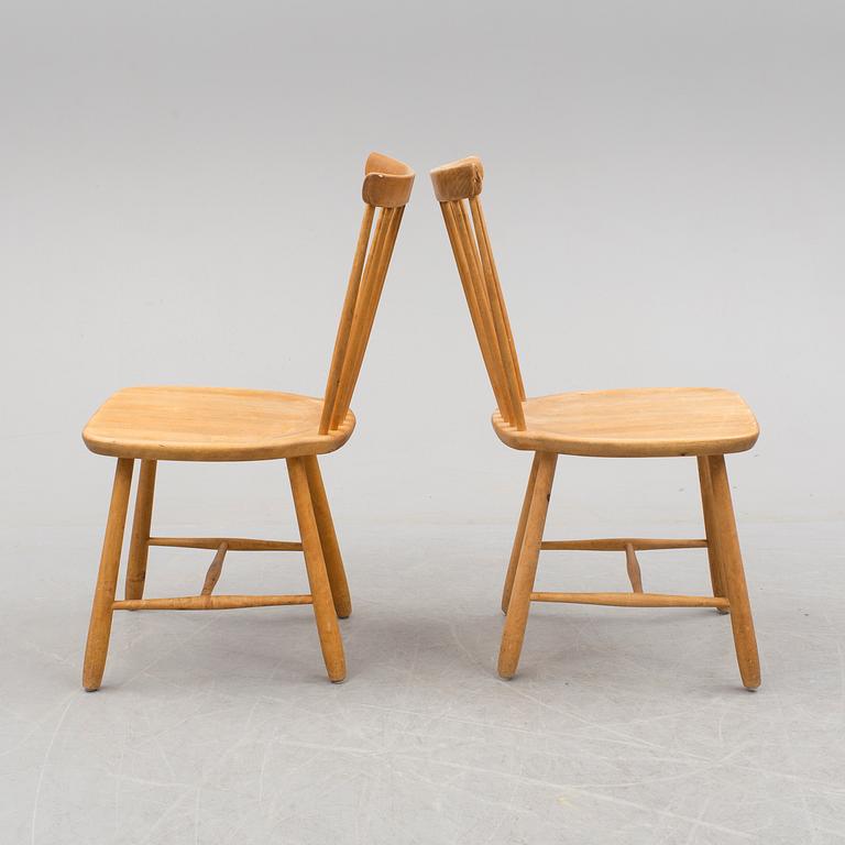 A pair of 'Lilla Åland' chairs by Carl Malmsten, second half of the 20th century.