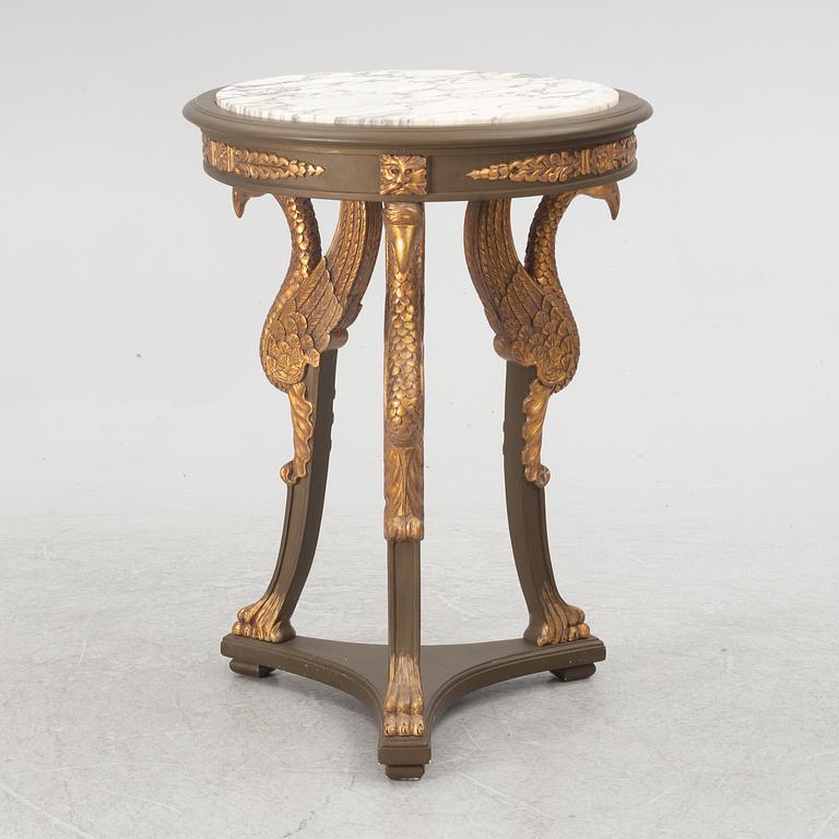 A pair of chairs and a side table, second half of the 20th century. Empire style.