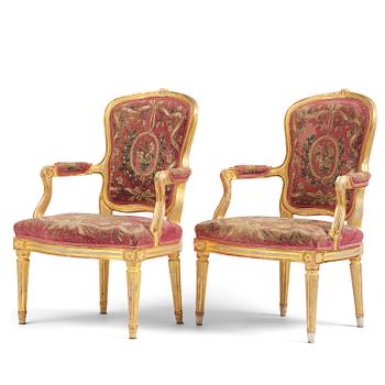 70. A pair of Gustavian giltwood open armchairs, Stockholm, late 18th century.