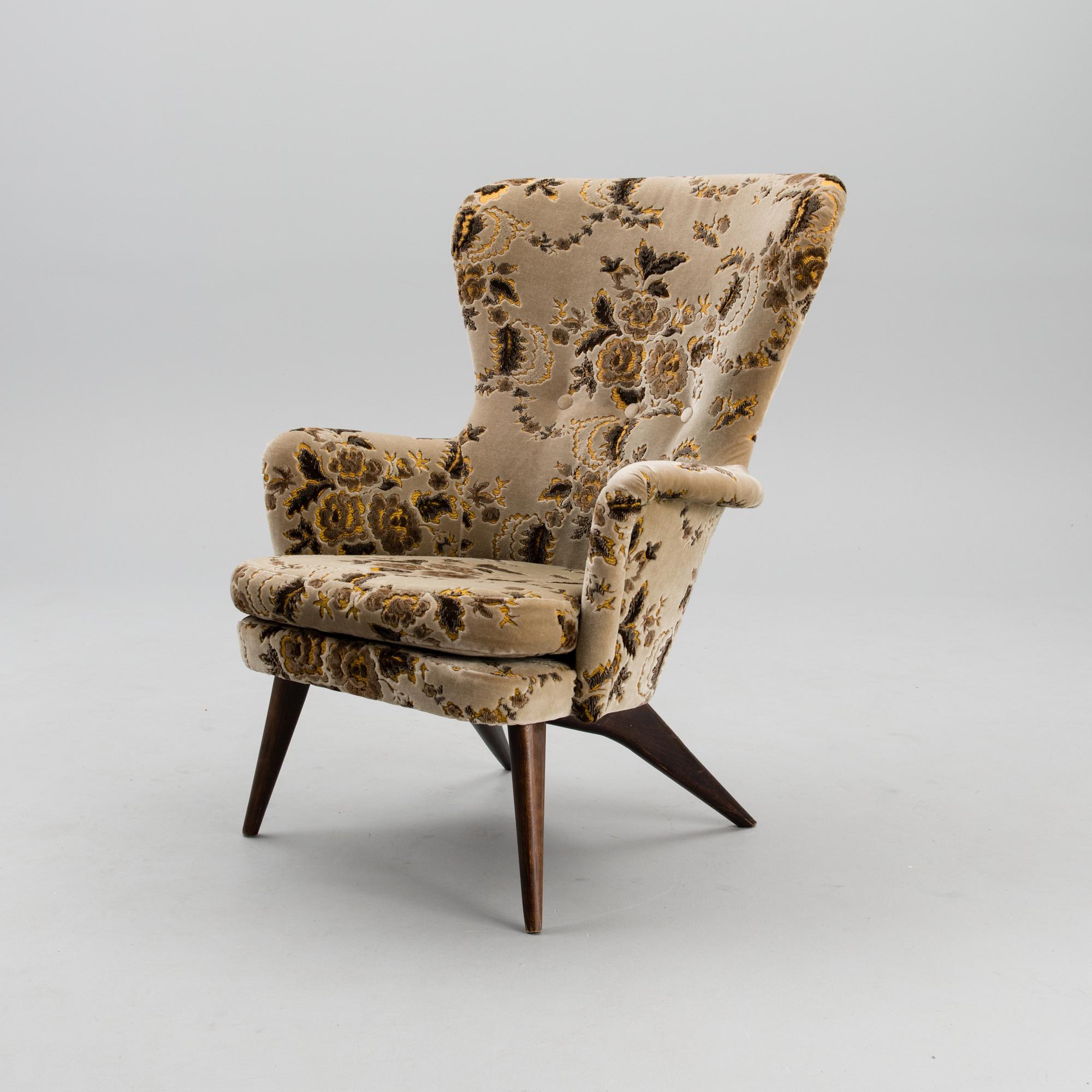 A mid-20th century armchair for Puunveisto Oy - Träsnideri Ab.