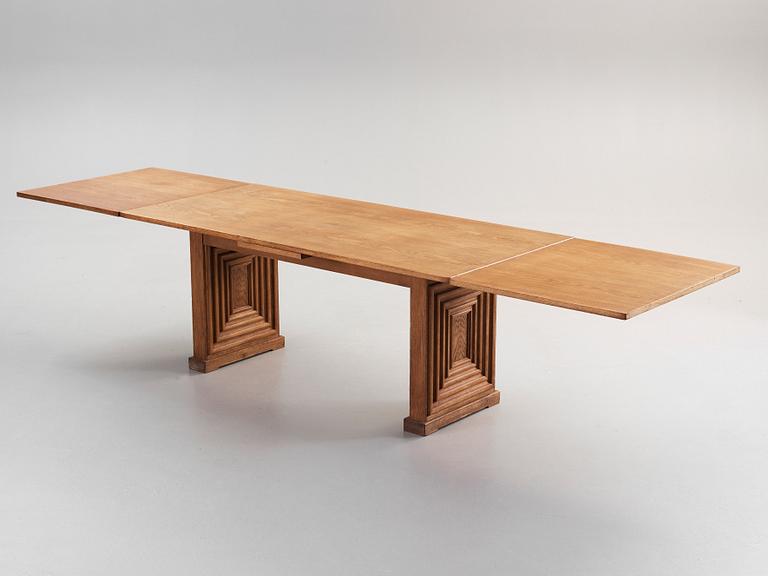 A Swedish Modern oak dining table, attributed to Oscar Nilsson, probably executed by cabinetmaker J Wickman, Stockholm,