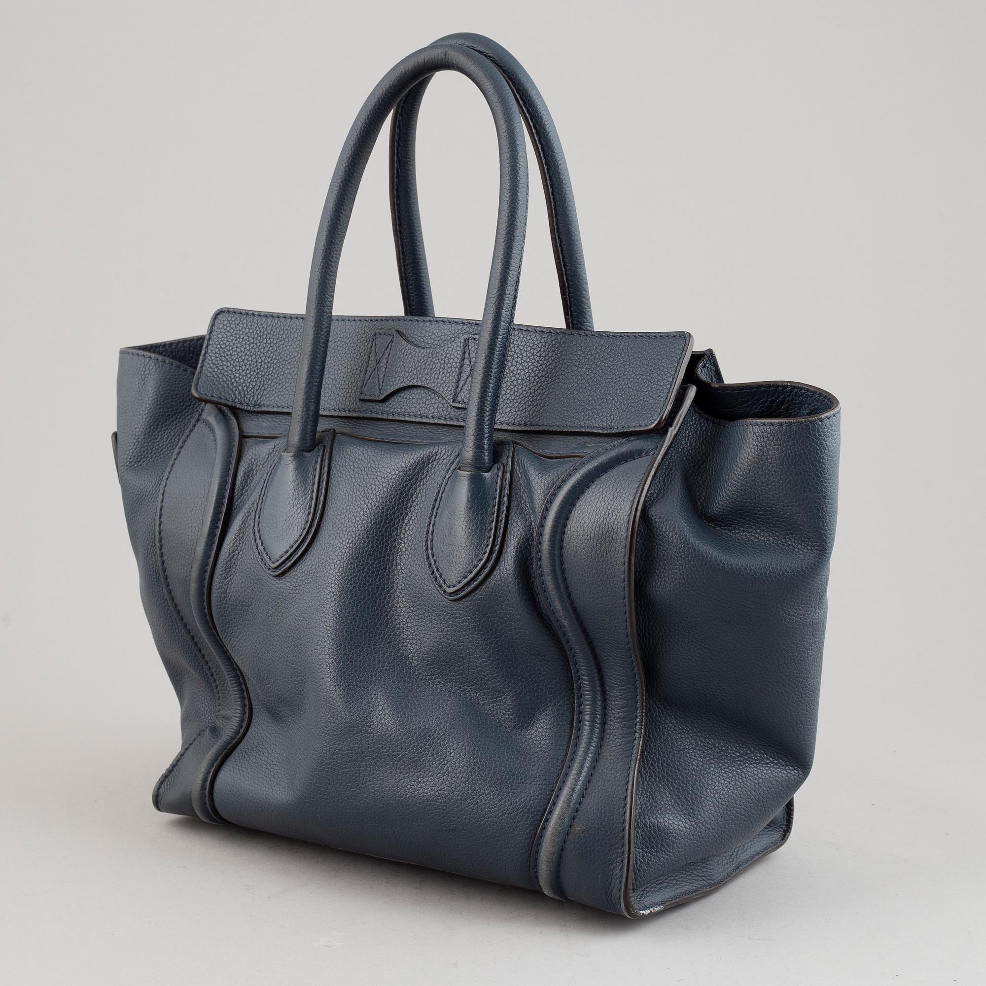 Céline, a teal leather 'Luggage' handbag.