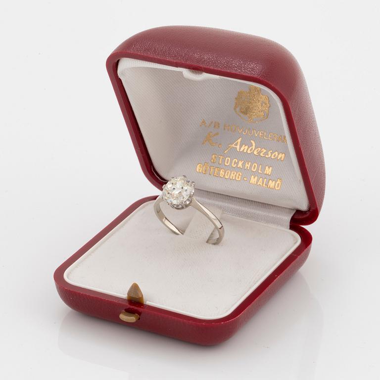 An 18K white gold ring set with a cushion formed old-cut diamond weight ca 2.75 cts quality ca L/M i.