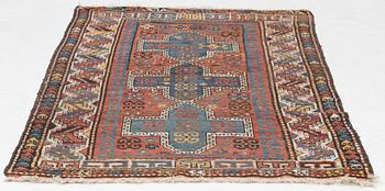 A semi-antique/antique Kazak rug, c. 200 x 120 cm.