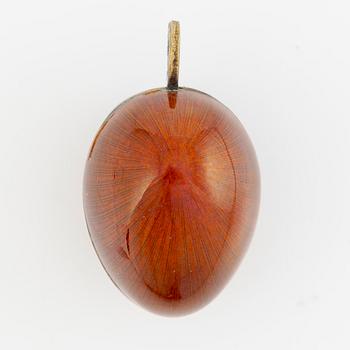 Pendant, in the form of an egg, A. Tillander, gilded silver and red enamel, Finland 1977.