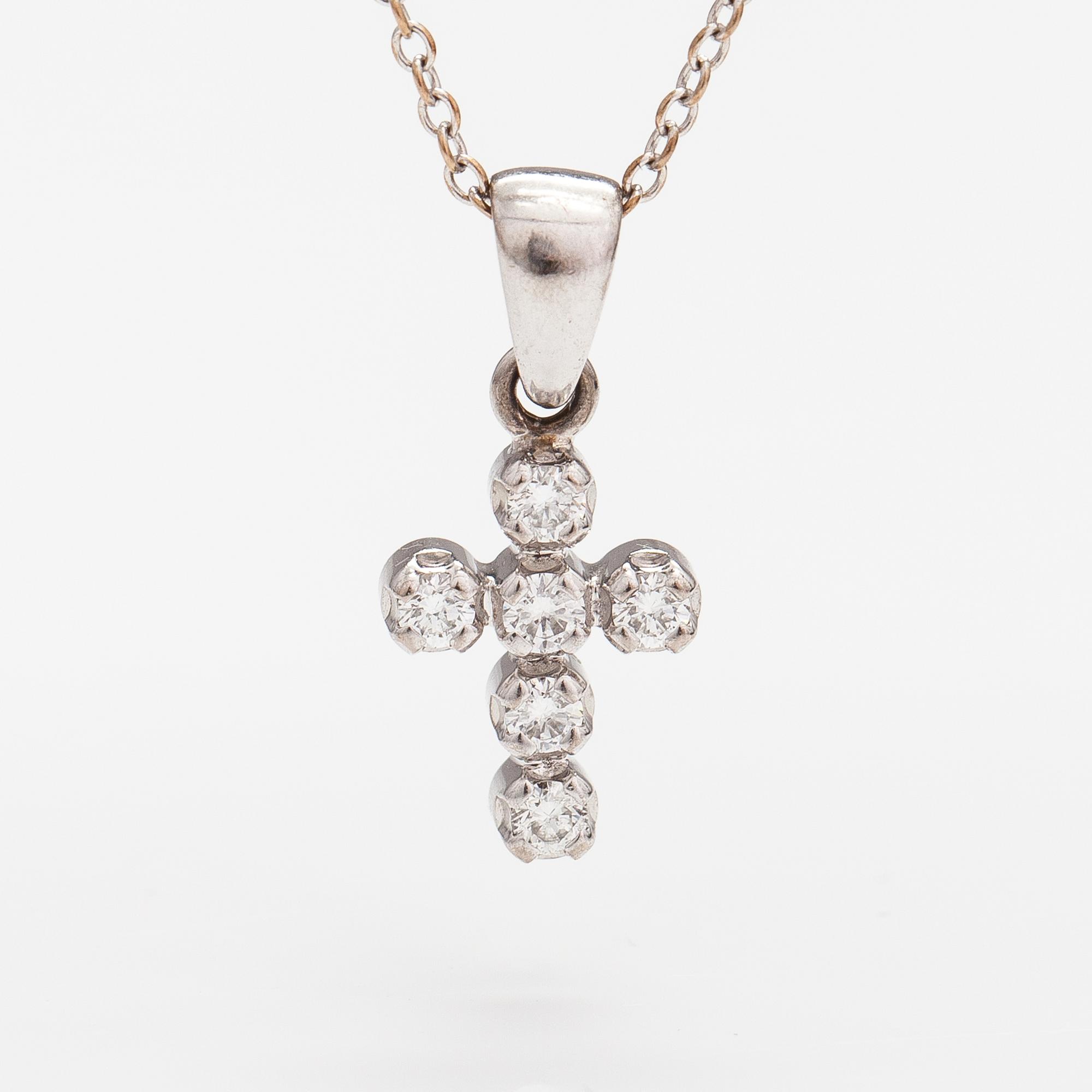 RISTI/RIIPUS, 18K valkokultaa, timantteja n. 0.18 ct yht. A Tillander, Helsinki.