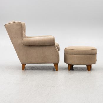 An armchair with footstool, Howard model, Englessons, 21st century.