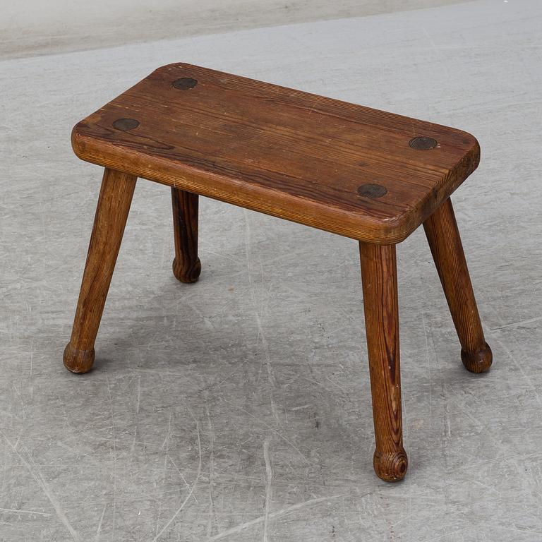 A late 20th Century stool.