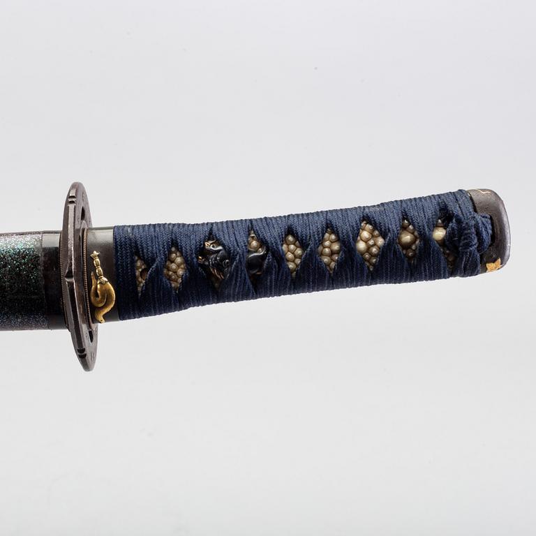 A Japanese Wakizashi late 19th century, signed.