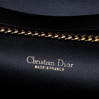 CHRISTIAN DIOR, a black canvas shoulder bag.