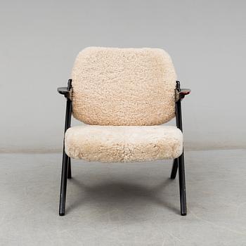 A 1950's 'Triva' easy chair by Bengt Ruda, from Nordiska Kompaniet.