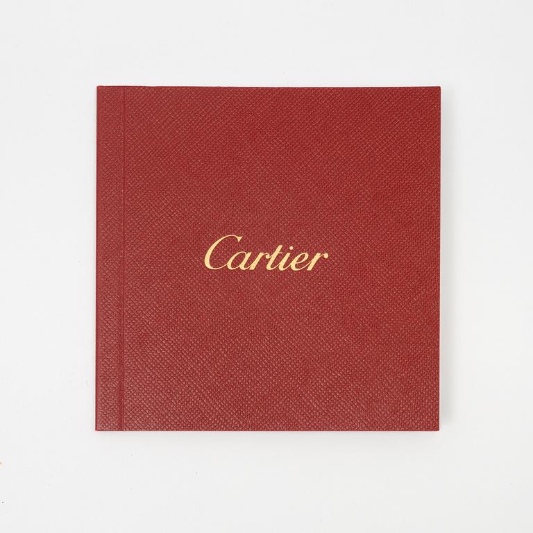 Cartier, a satin silk scarf.