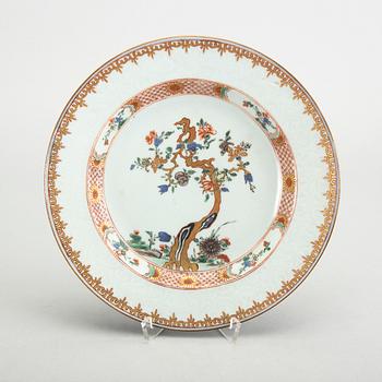 A Chinese Qianlong porcelain plate and dish in famille rose colours.