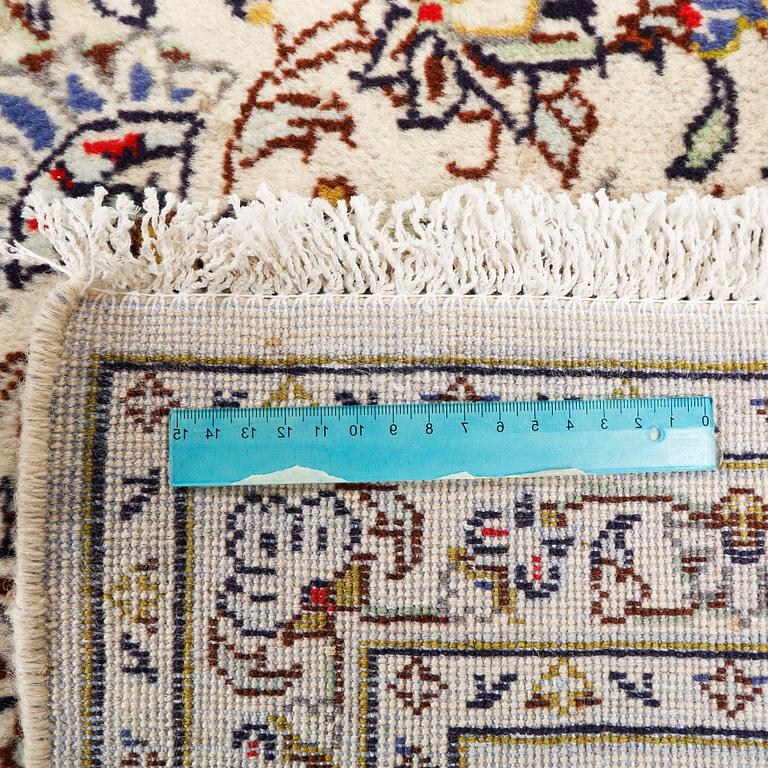 A Keshan rug, 340 x 236 cm.