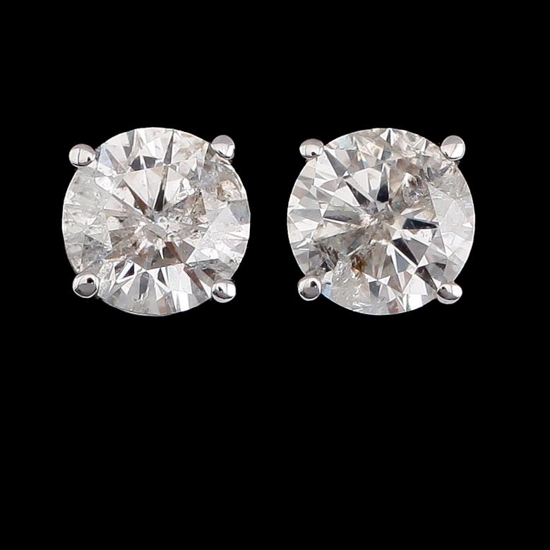 ÖRHÄNGEN, 1 par, 14 k vitguld, solitära briljantslipade diamanter tot ca 1.50 ct.