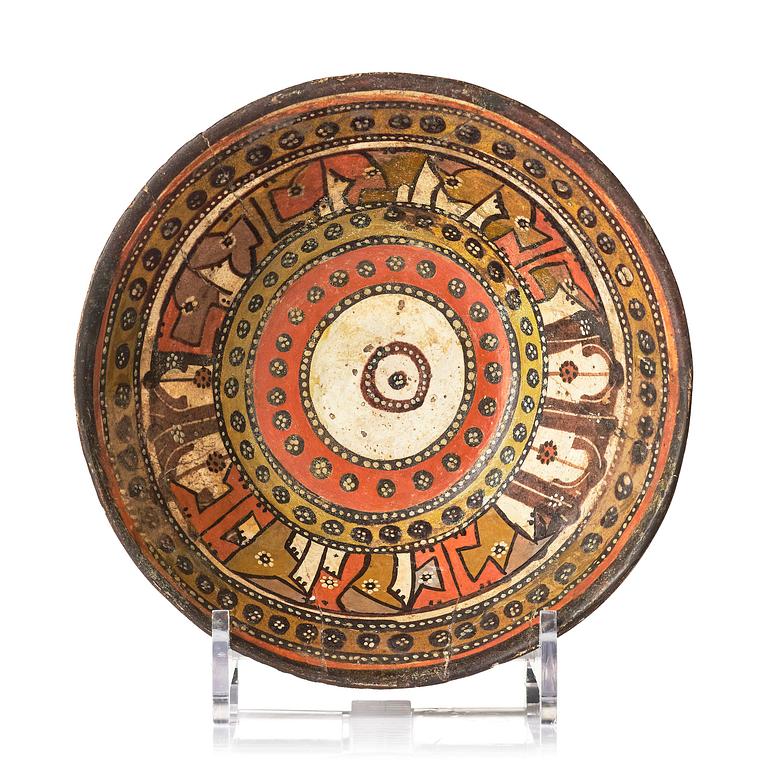 A conic pottery bowl, probably Nishapur, Northeast Persia, 10th century.