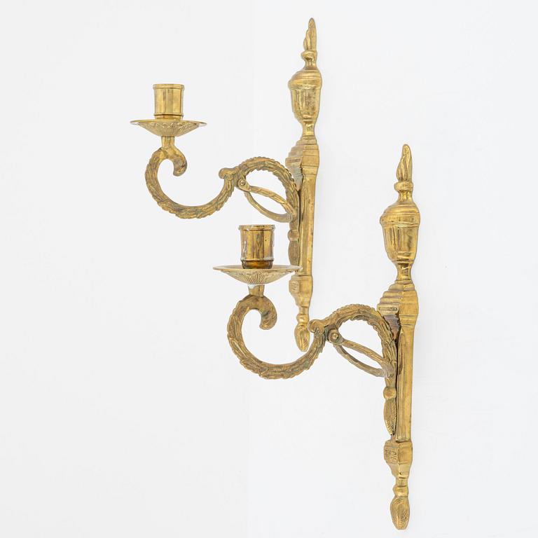 A pair of 'Törne' brass one-light wall ligths from IKEA's 18th Century collection.