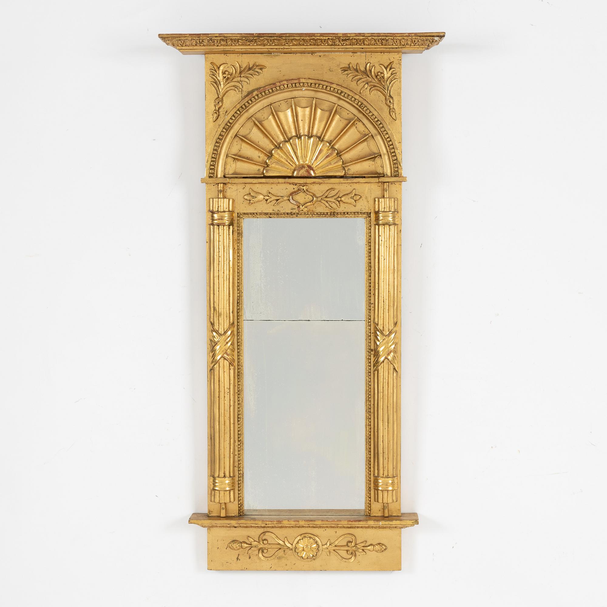 An Empire mirror, 1820.