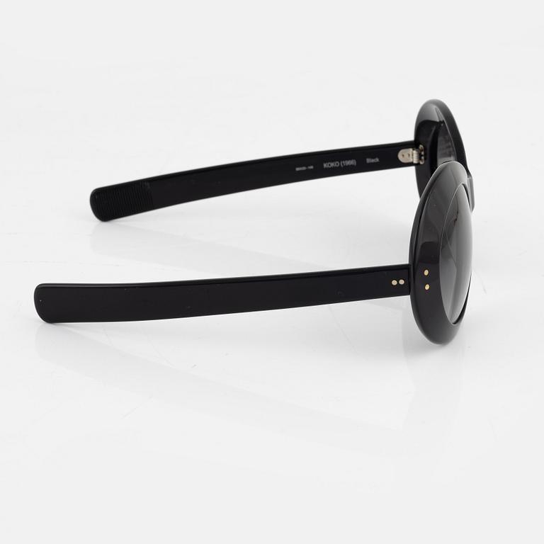 Oliver Goldsmith, a pair of black, "Koko" sunglasses.