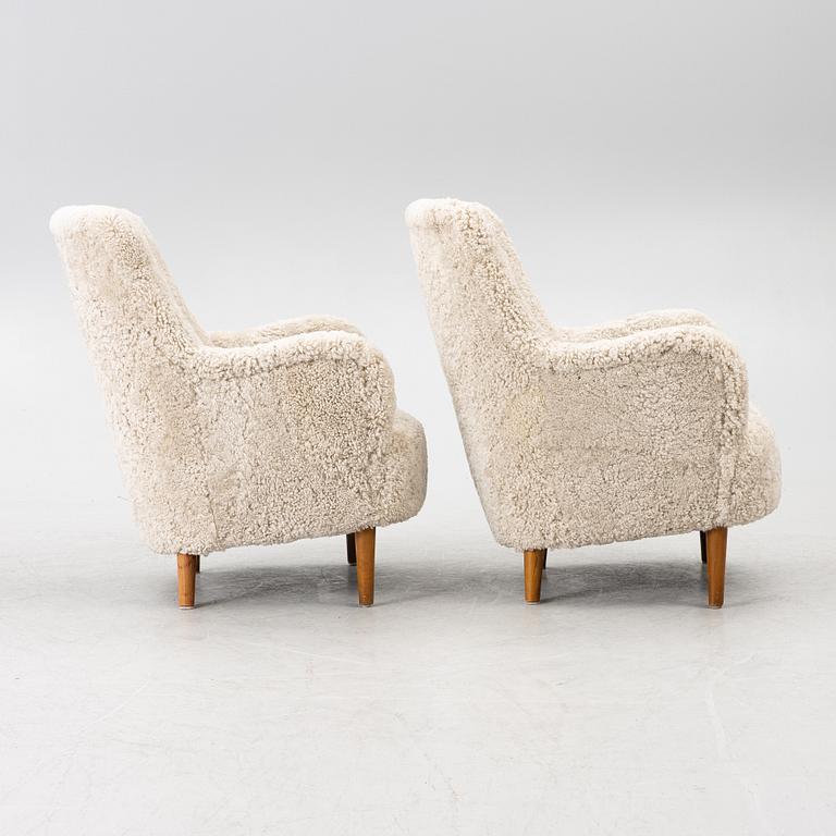 Carl Malmsten, A pair of Samsas easy chairs, second half of the 20th century.