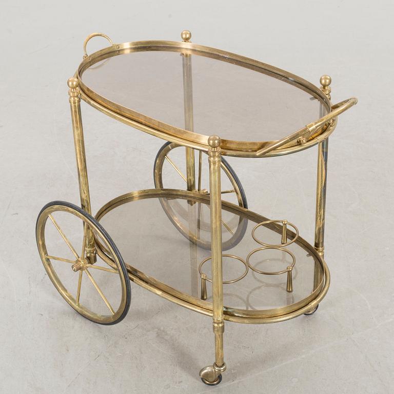 A brass serving trolley.