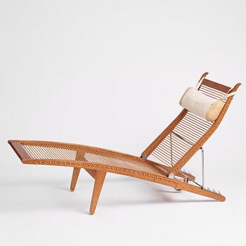 Hans J. Wegner, an oak lounge chair model "JH 524", Johannes Hansen, Copenhagen.