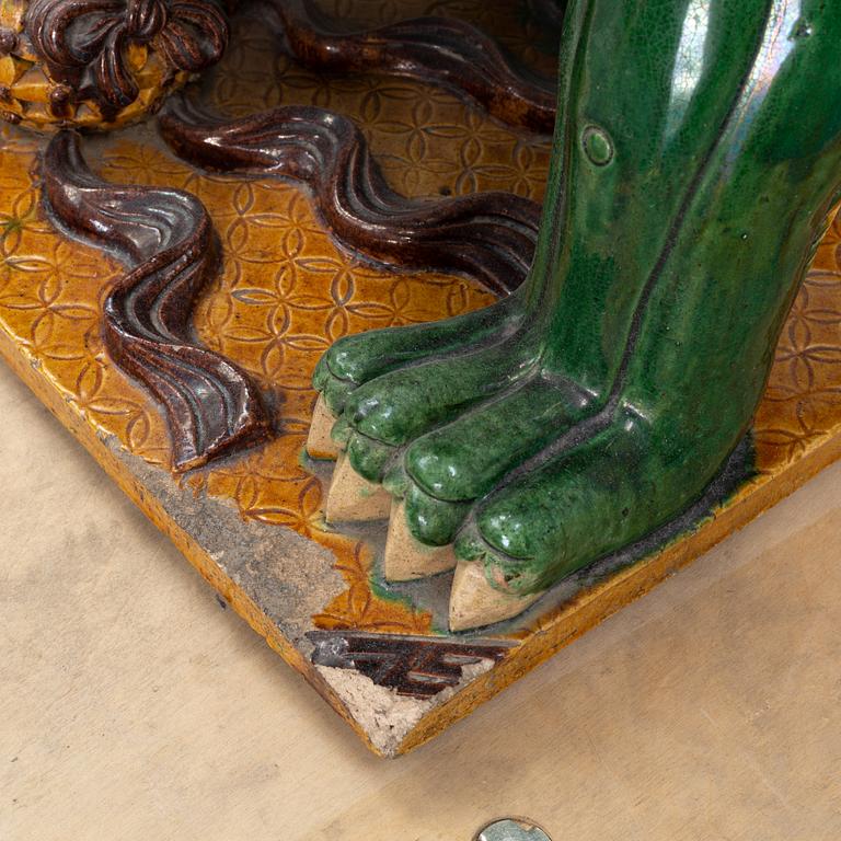 A pair of sancai-glazed chinese buddhist lions or guardian lions, early 20th century.