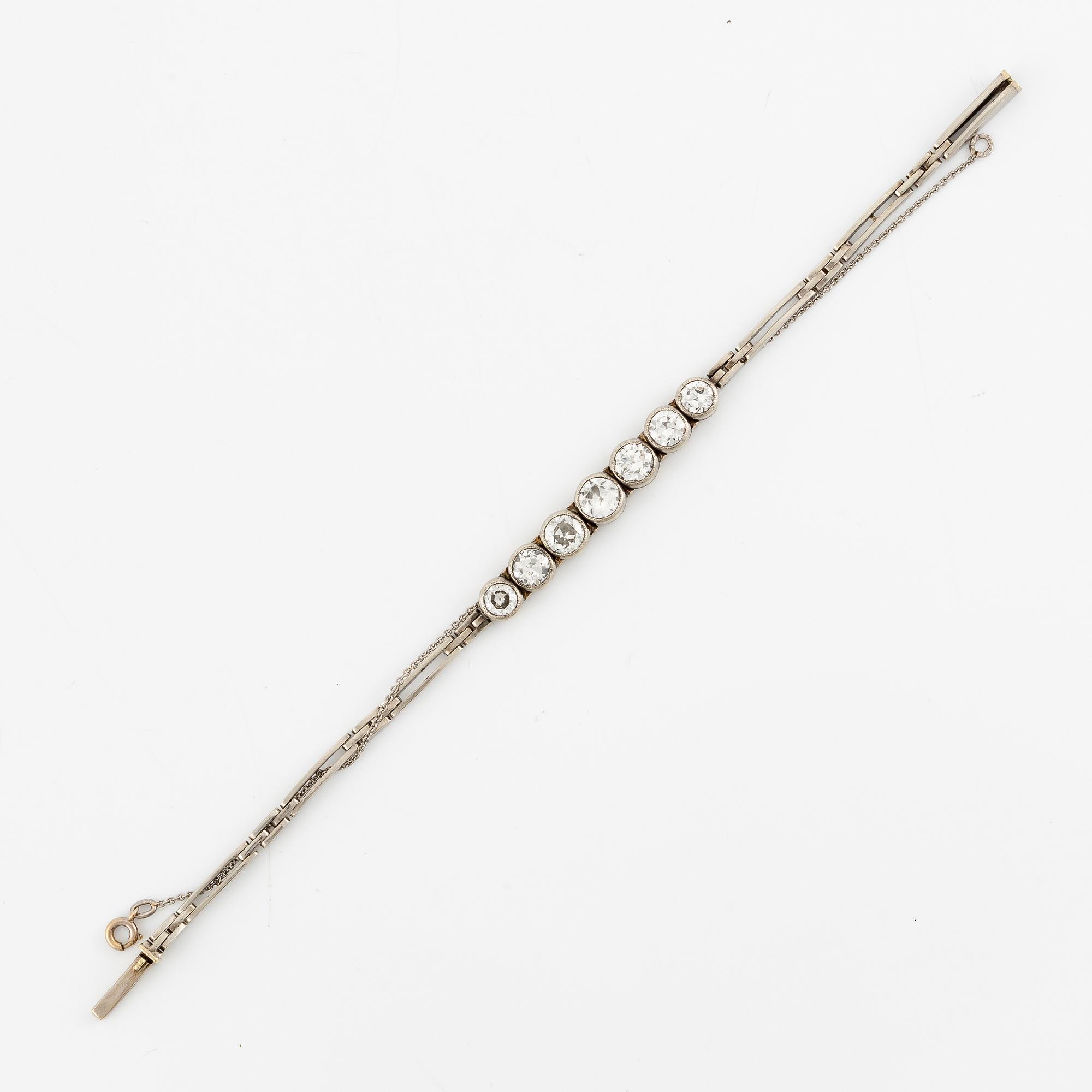 A bracelet in 14K white gold set with old-cut diamonds.