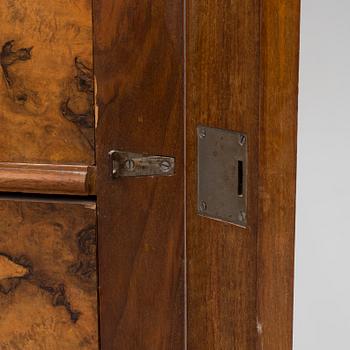 A late 19th century walnut veneered chest of drawers.