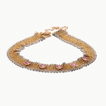 An 18K gold bracelet with old cut rubies, possibly by K Anderson Stockholm, around 1900's.