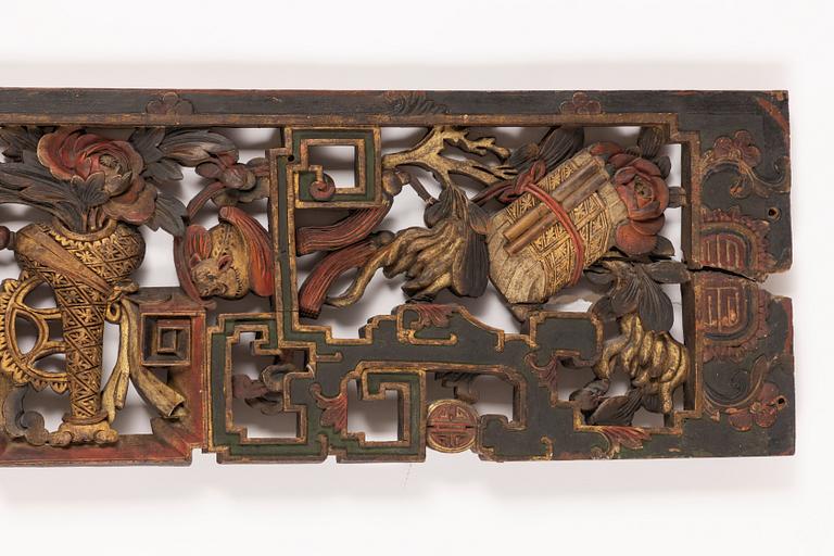 A Chinese carved wood panel, 19th Century.