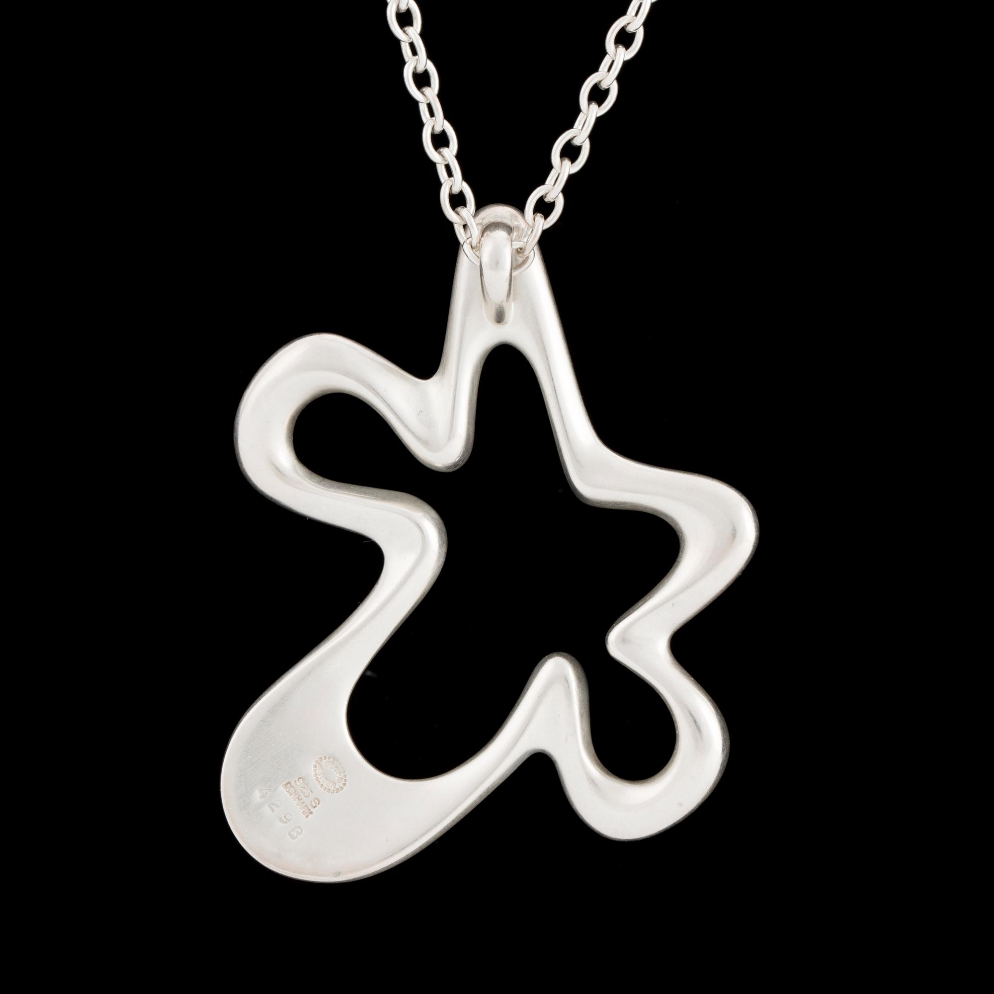 A sterling silver "Splash" pendant by Henning Koppel for Georg Jensen, Denmark.