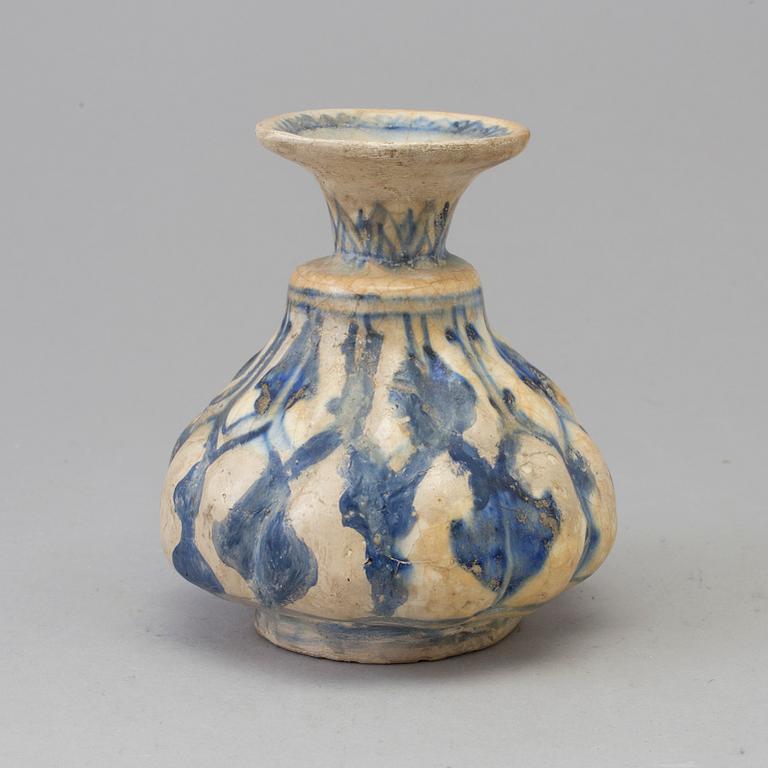 A 13th century persian pottery vase.
